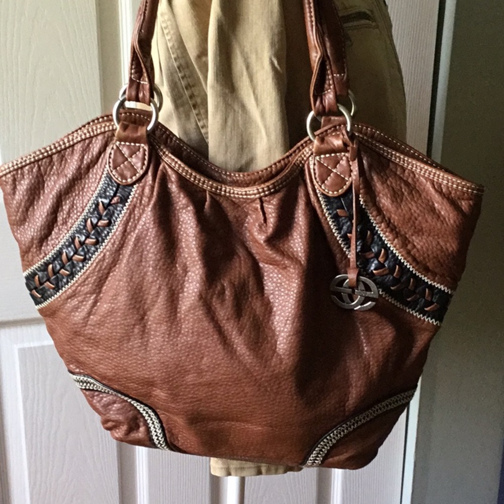 RED. Brown leather purse